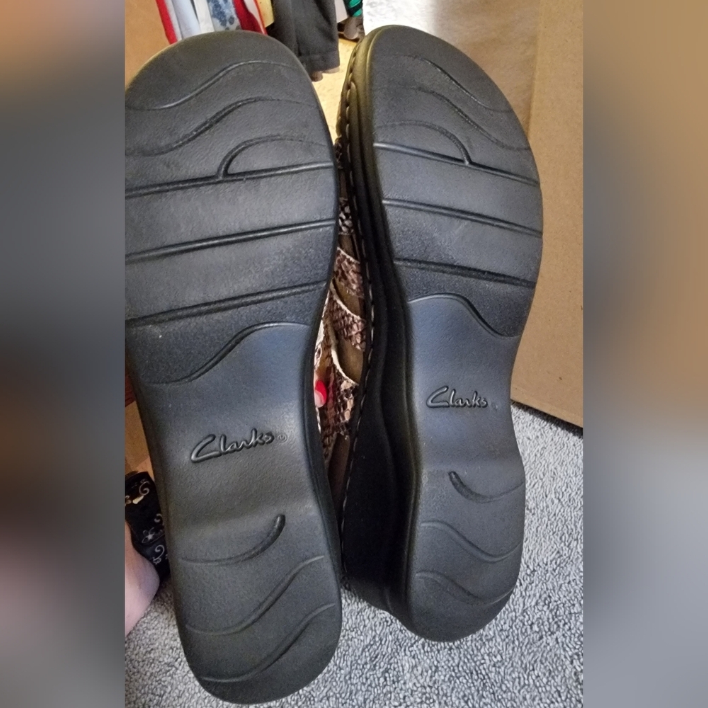 Like New-Clarks sandals. cool snakeskin print and comfy wedge sole. Size 8.5 - Picture 6 of 8